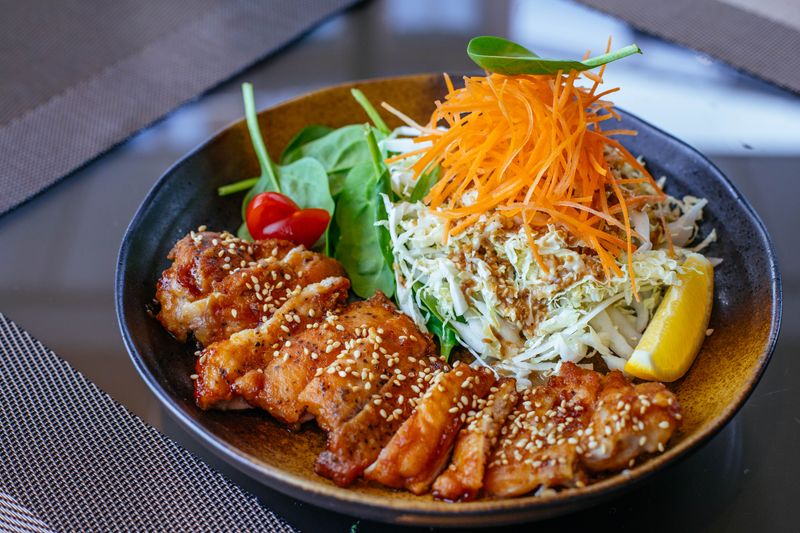 Fresh salad bowl with grilled starbird chicken strips